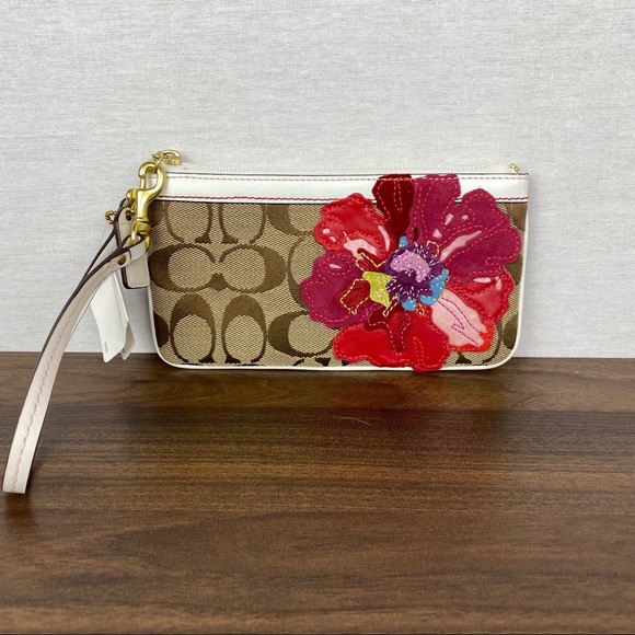Coach Handbags - NWT Coach Wristlet with Flower Embroidery
